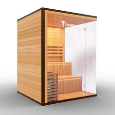 a wooden sauna with glass doors on the side