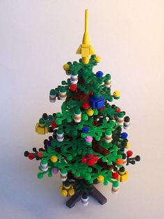 a lego christmas tree is shown on the wall