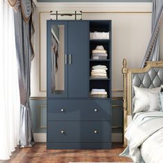 a blue armoire in a bedroom next to a bed