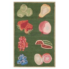 an area rug with various fruits and vegetables on it