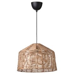 a light that is made out of wicker and has a black shade on it