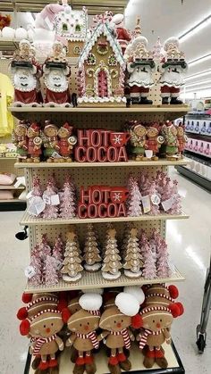 a christmas display in a store filled with lots of gingerbreads