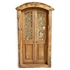 an old wooden door with glass panels