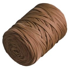 a roll of brown yarn on a white background