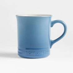 a blue coffee mug with the word icecream on it's side and bottom