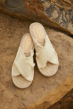 Get ready to explore your vacay destination in style in the Lulus Verka Beige Denim Espadrille Slide Sandals! Sturdy, frayed beige denim shapes a crisscrossing peep-toe upper, atop a jute-wrapped espadrille insole. Faux leather pad at heel adds some extra cushioning for maximum comfort all day long! Easy, slide-on design. 0. 25" rubber heel. Cushioned insole. Rubber sole has nonskid markings. Man made materials. Imported. Lulus | Verka Beige Denim Espadrille Slide Sandal Heels | Size 10. Denim Espadrilles, Pretty Little Dress, Espadrilles Slides, Pretty Sandals, Beige Sandals, Lulu Fashion, Sandal Heels, Leather Slide Sandals, Espadrille Sandals