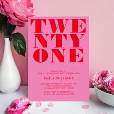 a pink card with the words two nyy one printed on it next to flowers