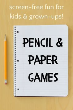 a notebook with the words pencil and paper games written on it next to a pencil