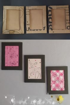 three frames are hanging on the wall with pink and black paper in front of them