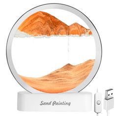 PRICES MAY VARY. 🌻【Moving Sand Art】：Every time you turn the deep sand art, you will get a brand new landscape picture. Watching the colored sand slowly roll down from the circle, watching the slowly forming landscape map, as if you are in the landscape. 🌻【Upgraded Version with LED Lights】：The upgraded moving sand picture is equipped with LED lights. Not only can you enjoy its mountains, rivers, lakes and seas during the day, but even at night, you can also use it as a bedside lamp. Under the w Moving Sand Art, Relaxing Decor, Sand Pictures, Images D'art, Sand Painting, Colored Sand, Painting Lamps, Image 3d, Fine Sand