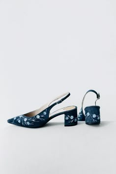 Wedding slingback pumps 'Tati' are handcrafted from navy blue Italian suede. The pair of bridal heels features handmade floral embroidery with flowers and vines that can be customized to your preference.  This design also have pointy toes and a 5.5 cm / 2.2 inches stable block heel. The heel also has the embroidery on all sides in the same pattern. These wedding shoes are designed with a V-notched vamp (v-cut) and closed toe which makes bridal sandals even more elegant and special. Take note that the base of the toes will be visible in these wedding slingbacks.  Inside there is a soft Memory foam insole, which gives a feeling of additional comfort when walking. Tunit outsole is made of a mixture of leather chips and rubber, it's more wear-resistant than leather and more durable. Also, we u Elegant Formal Heels With Floral Embroidery, Elegant Floral Embroidered Heels For Formal Occasions, Elegant Floral Embroidery Heels For Formal Occasions, Formal Heels With Floral Embroidery And Ankle Strap, Formal Floral Embroidered Ankle Strap Heels, Blue Wedding Sandals, Low Heel Dress Shoes, Navy Sandals, Wedding Pumps