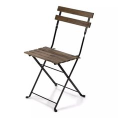 a wooden folding chair sitting on top of a white floor