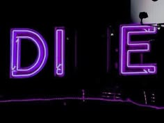 a neon sign that says die on it