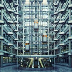 the inside of a building with multiple floors and balconies