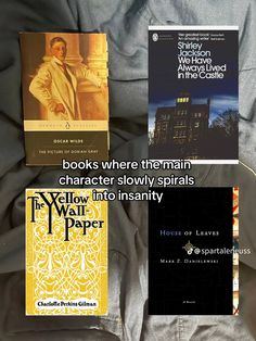 there are four books on the bed with each one's cover pulled back to reveal it