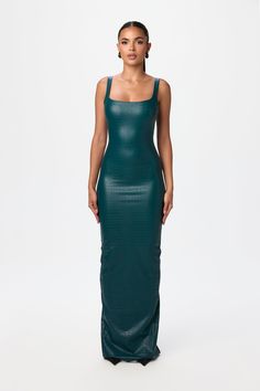 Our luxurious tank dress, reimagined in croc-embossed vegan leather. Featuring medium tank straps, back zip up closure, and a flattering scoop neck, the sculpting silhouette is designed to hug your curves with just enough give for comfortable wearability. Vegan Leather Collection Crocodile Collection Import Self: 50% PU, 44% Rayon, 6% Spandex Lining: 90% Polyester, 10% Spandex Model wears size X-Small True to size Soft inner lining Tank Maxi Dress, Swim Shop, Maxi Tank Dress, Deep Teal, Dress Jewelry, Tank Dress, Vegan Leather, Scoop Neck, Zip Ups