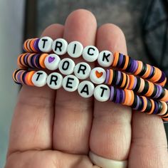 Set Of 3 Homemade Stretch Clay Bead Bracelets. Halloween Themed. A Great Addition To Your Halloween Attire. Purple, Orange And Black Colors That Say Trick Or Treat When Worn All Together. Clay Beads Bracelet Ideas For Halloween, Halloween Braclets Idea, Fall Themed Beaded Bracelet, Clay Bead Bracelet Sets Ideas, Halloween Glass Bead Bracelet, Clay Bead Bracelet Ideas Autumn, Preppy Halloween Clay Bead Bracelets, Clay Beads Ideas Halloween, Hocus Pocus Clay Bead Bracelet