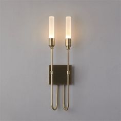 Illuminate your space with the Candela Contemporary Wall Sconce. With its soft light, this sconce creates a warm and inviting atmosphere, perfect for any room in your home. Add a touch of contemporary style and ambiance to your interior design with this sleek and modern lighting fixture. SPECIFICATIONS: Light Source: LED (Included) Style: Contemporary Installation Type: Wall Mounted Item Type: Wall Lamps Warranty: 3years Number of light sources: 1 Dimmable: No Dimensions: 1 Head W2.7" x H22" / 2 Heads W5.5" x H22" Material: Iron, Acrylic Shade Direction: Up & Down Power Source: AC Shade Type: Acrylic Model Number: 0301 Usage: Daily Lighting Base Type: Wedge Voltage: 90-260V Color: Gold Staircase Restaurant, Villa Staircase, Entryway Chandelier, Modern Living Room Wall, Wall Lamps Living Room, Contemporary Wall Sconces, Pendant Lighting Dining Room, Dining Room Light Fixtures, Hotel Villa