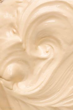 a close up view of some cream in a bowl