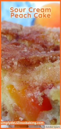 a close up of a piece of cake on a plate with the words sour cream peach cake