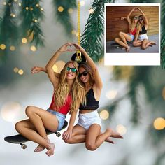 two beautiful young women hanging from a christmas tree