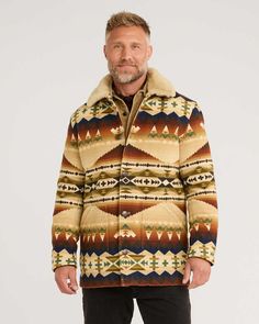 A Pendleton favorite, named for one of our earliest mills. Crafted from USA-woven blanket-weight wool, this iconic men's coat has a carefully matched pattern, and a beautiful genuine shearling collar. Button-front closure, two patch pockets. Inside, a special label tells the story of our Solstice Canyon design. 82% wool/18% cotton; genuine sheepskin collar. Lining: 100% polyester . Wool fabric woven in our American mills. Imported of USA-made fabric. | MEN'S BROWNSVILLE SHEARLING COLLAR COAT Baby Fabric, Book Clothes, Collar Coat, Wool Shirt, Collared Coat, Mens Pajamas, Woven Blanket, Wool Fabric, Pajamas Women