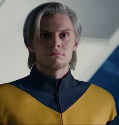 a man with grey hair wearing a star trek uniform