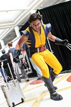 a man dressed as wolverine in an airport