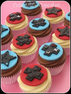 cupcakes decorated like video game controllers on top of each other