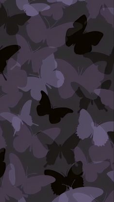 butterflies are flying in the air on a purple background