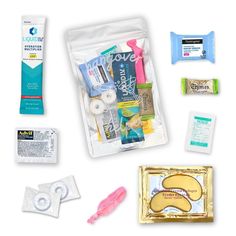 the contents of a travel bag are shown in this image, including toothpaste, mouthwashes, and dental floss