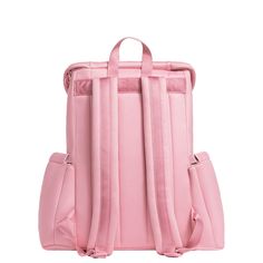 a pink backpack sitting on top of a white surface