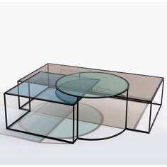 two tables with glass tops on each side, one is black and the other is clear