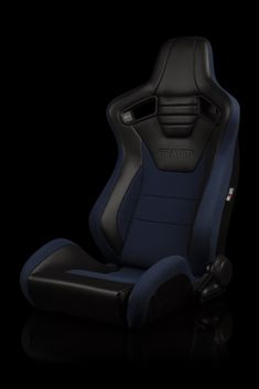 a black and blue gaming chair on a black background