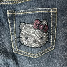 the hello kitty sequin pocket on someone's jeans