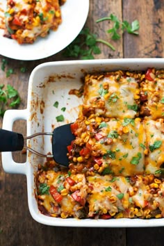 a casserole dish filled with mexican food