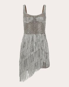 A true showstopper, this silk mini dress is decorated with Swarovski crystals and asymmetrically tiered fringe to create a shimmering, light-reflecting effect. Fitted at the waist, the bustier-inspired bodice sculpts a flattering shape with its padded cups, supportive underwire and built-in boning. Back clasp and zip closure Underwire Padded cups Boned bodice Bustier seams Open back Swarovski crystal embellishments Asymmetric fringe skirt 100% silk, exclusive of embellishments Dry clean only Mad Swarovski Dress, Maddie Hatter, Slow Horses, Music Video Outfits, Cutesy Outfits, Crystal Fringe, Dress Reference, Embellished Mini Dress, Edgy Glam