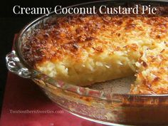 a close up of a pie in a pan with the words creamy coconut custard pie