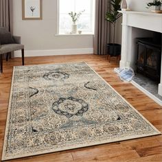 a living room with a fireplace and rug on the floor