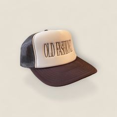 Stand out from the crowd with our Old Fashioned Trucker Hat in a classic khaki and brown color combination. Perfect for the playful and quirky drinker who always appreciates a good throwback cocktail. Cheers to making a statement with style! Vintage Distressed Brown Hat With Curved Brim, Vintage Distressed Brown Brimmed Hat, Distressed Brown Brimmed Vintage Hat, Vintage Short Brim Hat For Streetwear, Classic Brown Trucker Hat, Retro Outdoor Hat, Vintage Black Trucker Hat For Spring, Vintage Beige Hat For Outdoors, Vintage Beige Hat For Outdoor