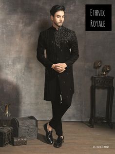 Step into the spotlight with our Superb Black Groom Outfit ensemble, perfect for men looking to make a statement at engagements, receptions, or weddings. This striking outfit combines traditional Indian craftsmanship with contemporary style, featuring exquisite detailing and a modern silhouette. Crafted with care and precision, this ensemble exudes elegance and sophistication, making it the ideal choice for the discerning groom. Elevate your wedding attire with this stunning indowestern sherwani and leave a lasting impression on your special day. Please note: This is a made-to-measure product. Simply select your approximate chest size when placing your order. Once your order is received, we will contact you to schedule a video call for complete measurements. Cost Includes: Sherwani (jacket Reception Dress Groom, Engagement Dress Groom, Men Sherwani Wedding Indian Groom, Men Sherwani Wedding, Sherwani Jacket, Embroidery Shirt Men, India Fashion Men, Stylish Boy Clothes, Black Groom