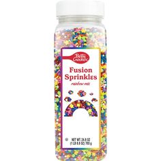 a jar filled with lots of colorful sprinkles