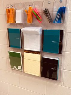 the wall is filled with office supplies and stationery