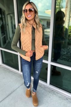 Fall is finally here! Throw on your "College Prep" vest, grab a pumpkin spiced coffee, and go about your day making Simply Me look good, girl! Mia is 5’2 size 0/1 wearing a small Britt is 5’6 size 7/9 34DD wearing a large FIT: True to size. But if you plan to wear chunky layers underneath, you might want to size up. Quilted vest with suede piping and gold accents. 100% Polyester Outfits With Tan Vests For Women, Shacket Vest Outfit, Camel Vest Outfits For Women, Tan Vest Outfits For Women, Carhartt Vest Outfit Woman, Fall Vest Outfits Women, Pumpkin Spiced Coffee, Fall Vest Outfits, Vest Outfit Women