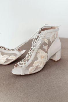 Romantic lace wedding boots with a peep toe and lace-up down the front. They are decorated with lace embroidery with roses and roe leaves. Thanks to the adjustable lacing, this pair will fit any foot width. Comfortable wedding bridal shoes for a day of dancing and fun, the elegant block heel is only 5.5 cm / 2.2 inches. Inside there is a soft memory foam insole, which gives a feeling of additional comfort when walking. Tunit outsole is made of a mixture of leather chips and rubber, it's more wea Floral Wedding Shoes, Lace Wedding Boots, Boots With Laces, 2024 Fits, Bridal Shoes Low Heel, Secret Wedding, Bridal Boots, Pointy Heels, Wedding Boots