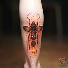 a woman's leg with a bee on it and neon lights around the legs