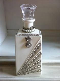 a bottle that has some beads on it