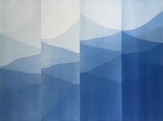 a blue and white painting with mountains in the background