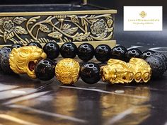 Perfect gift for yourself or your love once. Materials: Au999 Pure Gold, Lava, and Onyx Stone *Karat: 24K Pure Gold  *Gold Weight: Approximately 5.77Grams *Stone Size: Approx. 10.2mm *Gold Money Ball: 12mm  *HANDMADE ●●NOT Gold filled; NOT Gold plated. Hallmarked 🧧The tiger is a powerful symbol of strength, courage, and protection. It is also a symbol of good luck and abundance. The tiger does the job of accumulating wealth.  🧧The meteological creature Pixiu or Tianlu is believed to guard and accumulate wealth.       If your having bad luck financially or you want to guard your wealth, then Pixiu is the perfect choice for you. SH I P P I N G Free shipping in the US and International orders Spiritual Gold Bracelet With Round Beads As Gift, Gold Bracelets With Round Beads As Gift, Gold Bracelets With Round Beads For Gifts, Handmade Gold Beaded Bracelets For Anniversary, Traditional Gold Bracelets As Gifts, Gold Spiritual Bracelets As Gifts, Traditional Gold Bracelet, Money Ball, Feng Shui Bracelet