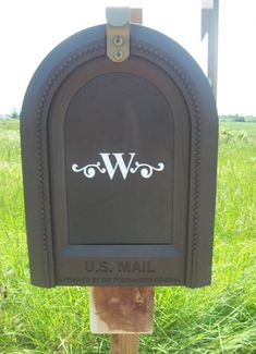 a mailbox with the letter w on it